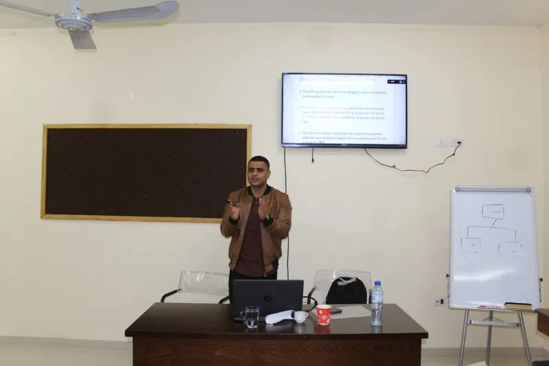 Adnan teaching a class on the history of user experience design